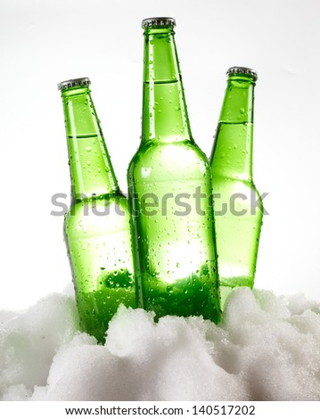 beer bottles in snow
