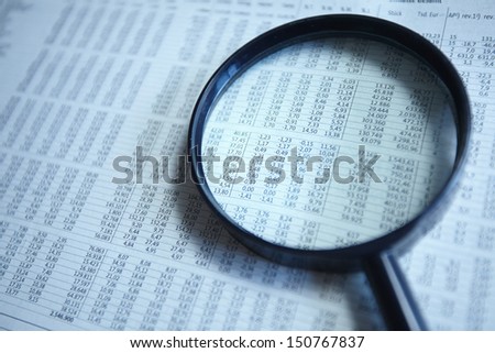 Magnifying glass on the document