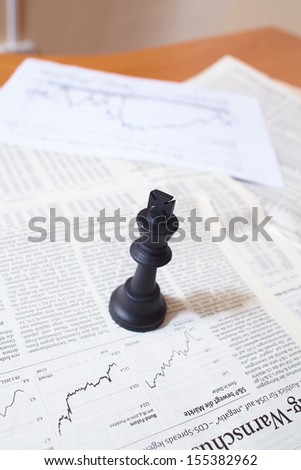 Chess piece on the document