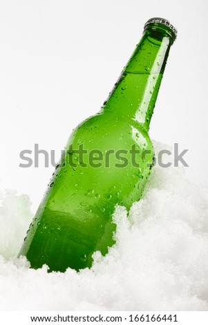 beer bottle in snow