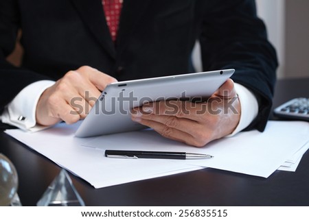 businessmen with digital tablet