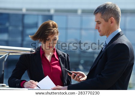 business man and woman outdoor