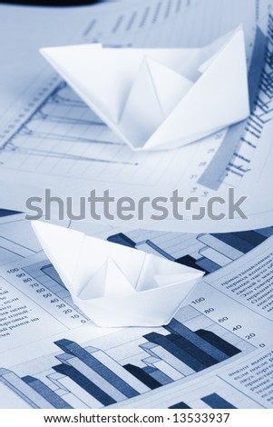 Business concept, paper boat and documents