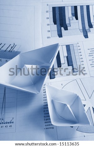 Business concept, paper boat and documents