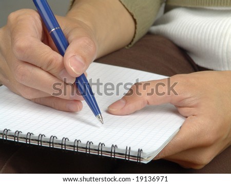 hand filling in a form