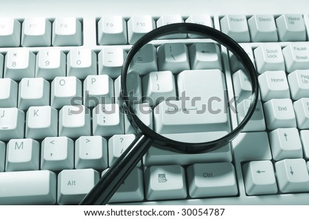 Magnifying glass, button, key