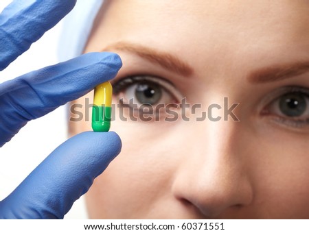 medical doctor with pill