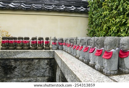 Row of stone statues at Tenryuji temple in Kyoto, Japan