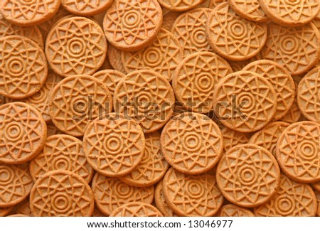 Brown colored rounded cookie background, natural texture and patterns