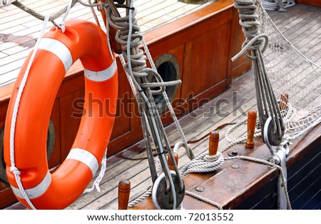 Color picture showing vessel deck with nautical equipment
