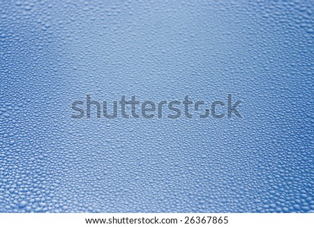 great number of transparent bubbles on a dark blue background