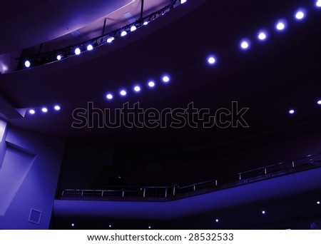 light in a dark hall during a theatrical performance