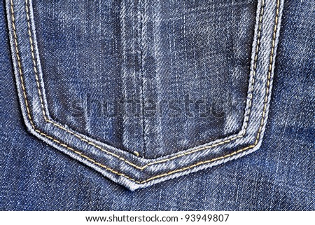 fashionable shabby blue jeans with sewn pocket