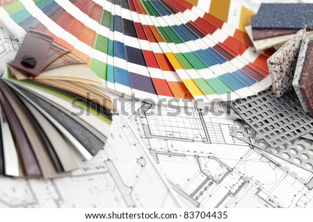 palette of colors designs for interior works, samples of plastics, PVC, for furnishing, artificial stone, perforated metal, coated with a polymer and architectural plans for houses
