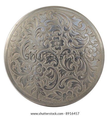 Round silver plate. Traditional asian decorations carved.