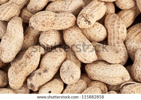 Background made of roasted peanuts in a pile