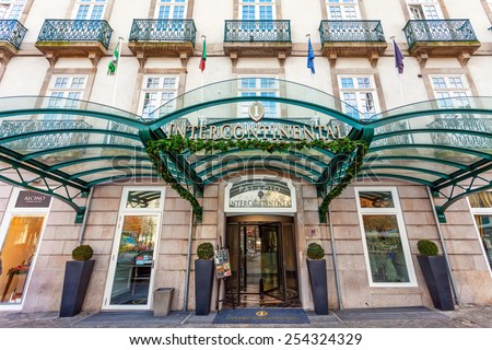 Porto, Portugal. January 5, 2015: Entrance of the Palacio das Cardosas Intercontinental Hotel facing the Aliados Avenue and Liberdade Square. A five stars hotel.