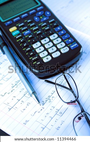Scientific Calculator with exercise books and glasses