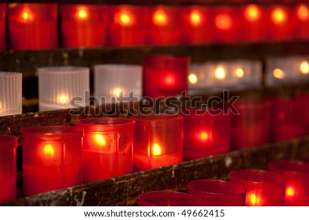 Burning candles for promise payment in catholic church