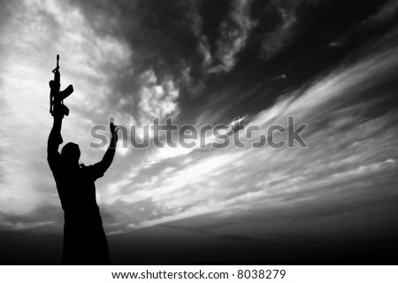 Silhouette of the soldier with the weapon
