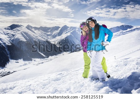 Ski people on winter mountain alpine resort