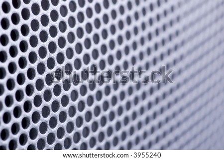 diminishing perspective of an perforated metal texture