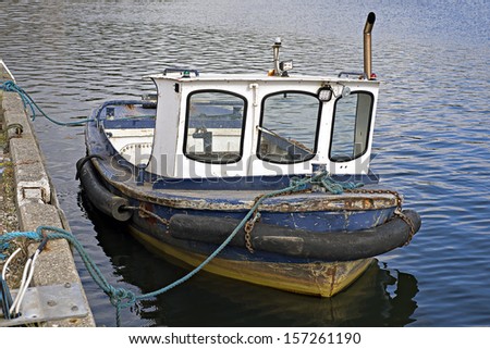 Vintage motor boat in  harbor