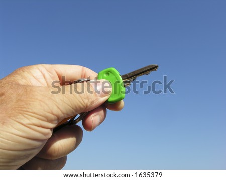 Key in the left Hand ready for opening a Door.