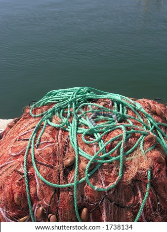 Red and Orange Fishing Net nearby Mediterranean Sea