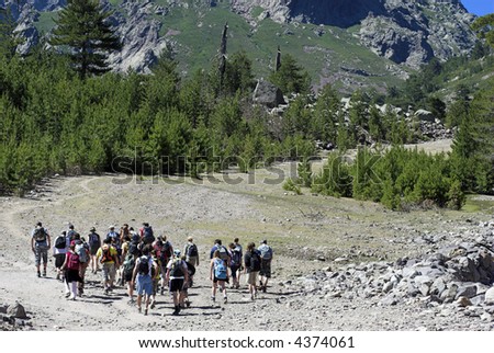 Backpacker People on Mountain Hiking