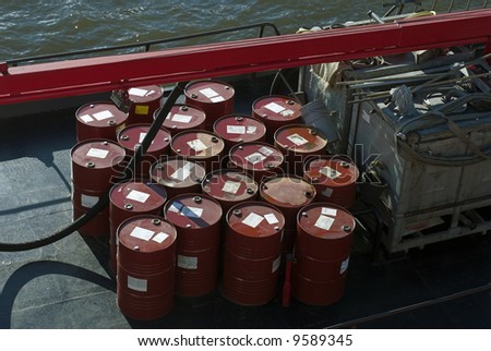 Industrial barrels stored outside on ship deck