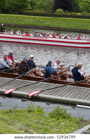 People in boats – motorboat and rowing boat