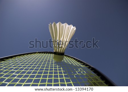 Play the Shuttlecock - Badminton Racket and Shuttlecock close-Up and High Sky Blue