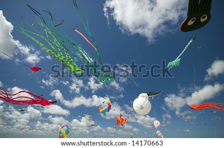 Fun in the Air. Fantasy Kites High-Up in the Blue Sky a Sunny Day on the Beach. Kite Flying Festival on Fanoe, Denmark.