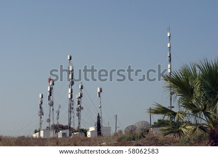 Various types of communication towers all over.