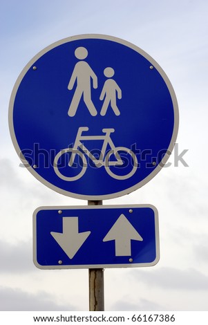 Blue and white walk and bicycle sign