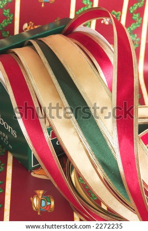 Christmas ribbons with gift wrapping paper