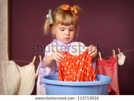 the girl the hostess washes clothes