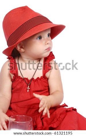 The little girl in a red hat on a white background