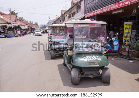 POI PET, THAILAND - MARCH 19: Thai golf car for rent waiting for customers on march 19, 2014 in Poi Pet, Thailand.
