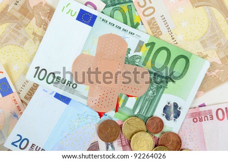 Injured euro money with a band-aid