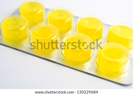 Close up yellow pill./Yellow Pills.
