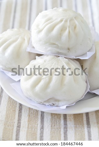 Chinese dumplings, Dim sum,steamed dumpling on white plate.