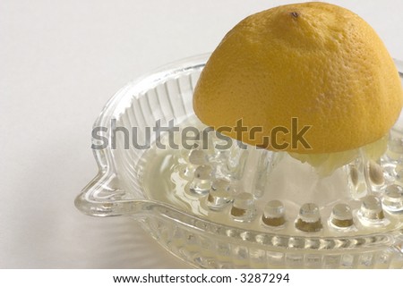 lemon on lemon squeezer