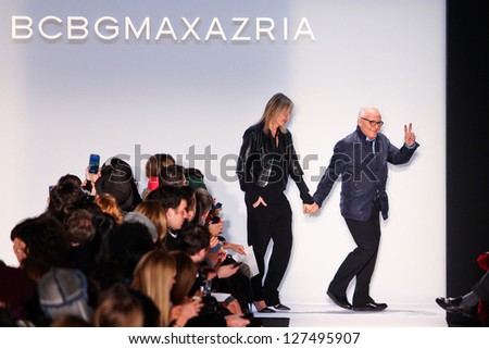 NEW YORK - FEBRUARY 07:A designer Max Azria with guest walks the runway at the BCBGMAXAZRIA Fall 2013 collection Mercedes-Benz Fashion Week in New York on February 07,2013