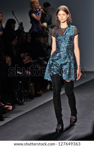 NEW YORK - FEBRUARY 07:A model walks the runway at the Timo Weiland Women`s  Fall 2013 collection Mercedes-Benz Fashion Week in New York on February 07,2013