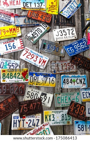 BAR HARBOR, MAINE - JULY 8: Old car license plates on the outside wall in Bar Harbor on July 8, 2013.