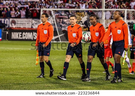 HARTFORD - OCTOBER 10: Referees on Rentschler Field stadium before soccer match between US Men`s National Team vs Ecuador, on October 10, 2014, in Rentschler Field stadium, Hartford, USA.
