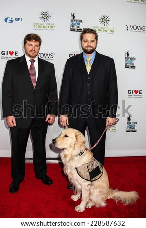 NEW YORK, NY - NOVEMBER 05: (L-R) Jake Young, Marshall Peters and Service Dog Lundy attend 2014 Stand Up For Heroes at Madison Square Garden on November 5, 2014 in New York City