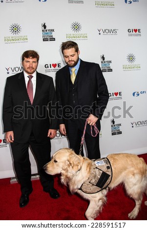 NEW YORK, NY - NOVEMBER 05: (L-R) Jake Young, Marshall Peters, Petty Officer 3rd Officer, US Navy, Veteran, and Service Dog Lundy attend  Stand Up For Heroes  November 5, 2014 in New York City